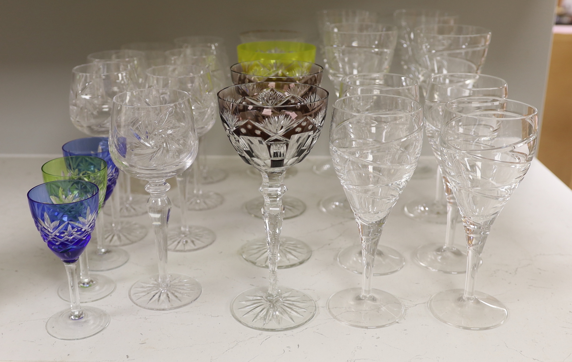 A collection of wine glasses including six flashed glass examples, the largest 23cm high
